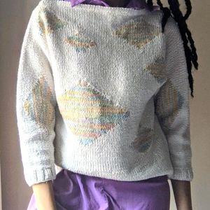 Handmade white and pastel knot sweater